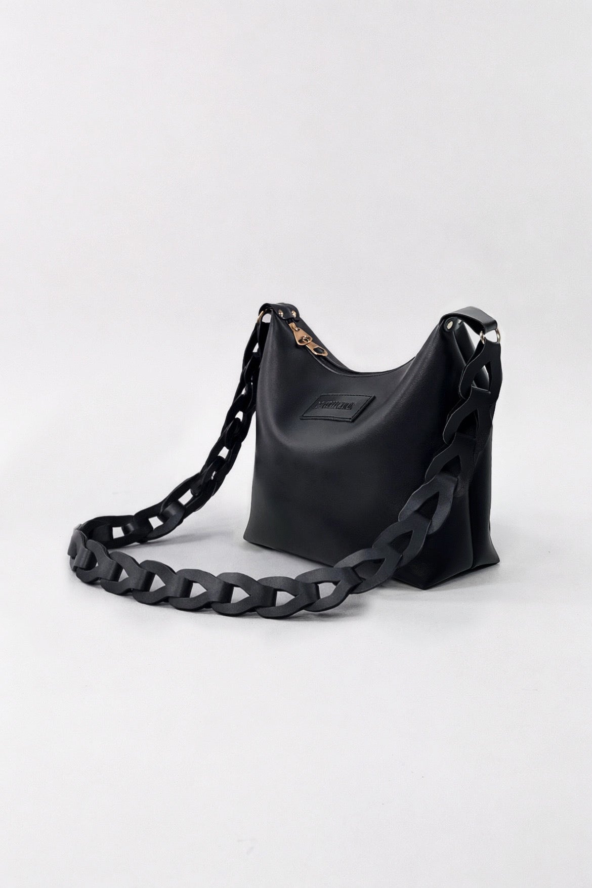 Women’s Black Shoulder Bag with Bold Chain